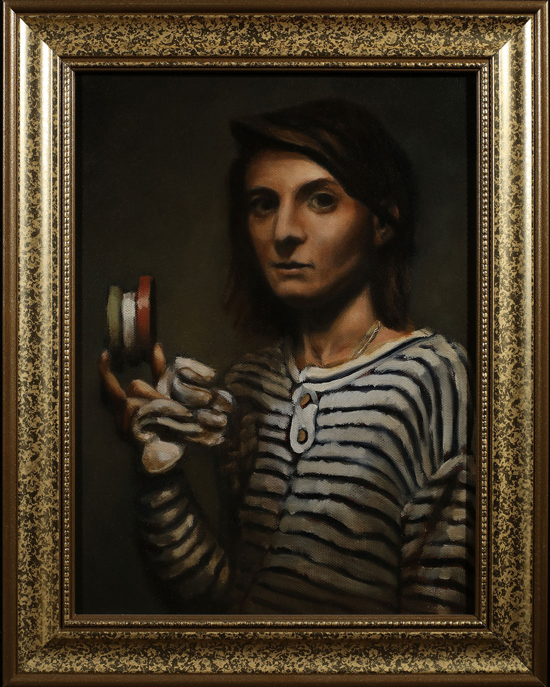 Federica holding camera tape and gloves.