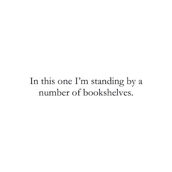 In this one I'm standing by a number of bookshelves.